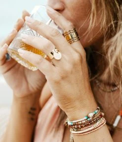 Bague Mandosa (Acier Doré) 7 Bague Mandosa (Acier Doré) -Zagbijoux Boutique bague mandosa acier dore portee 1