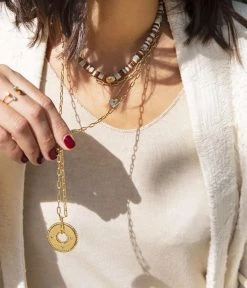 Collier U2 Nacre (Acier Doré) -Zagbijoux Boutique collier u2 nacre acier dore 1